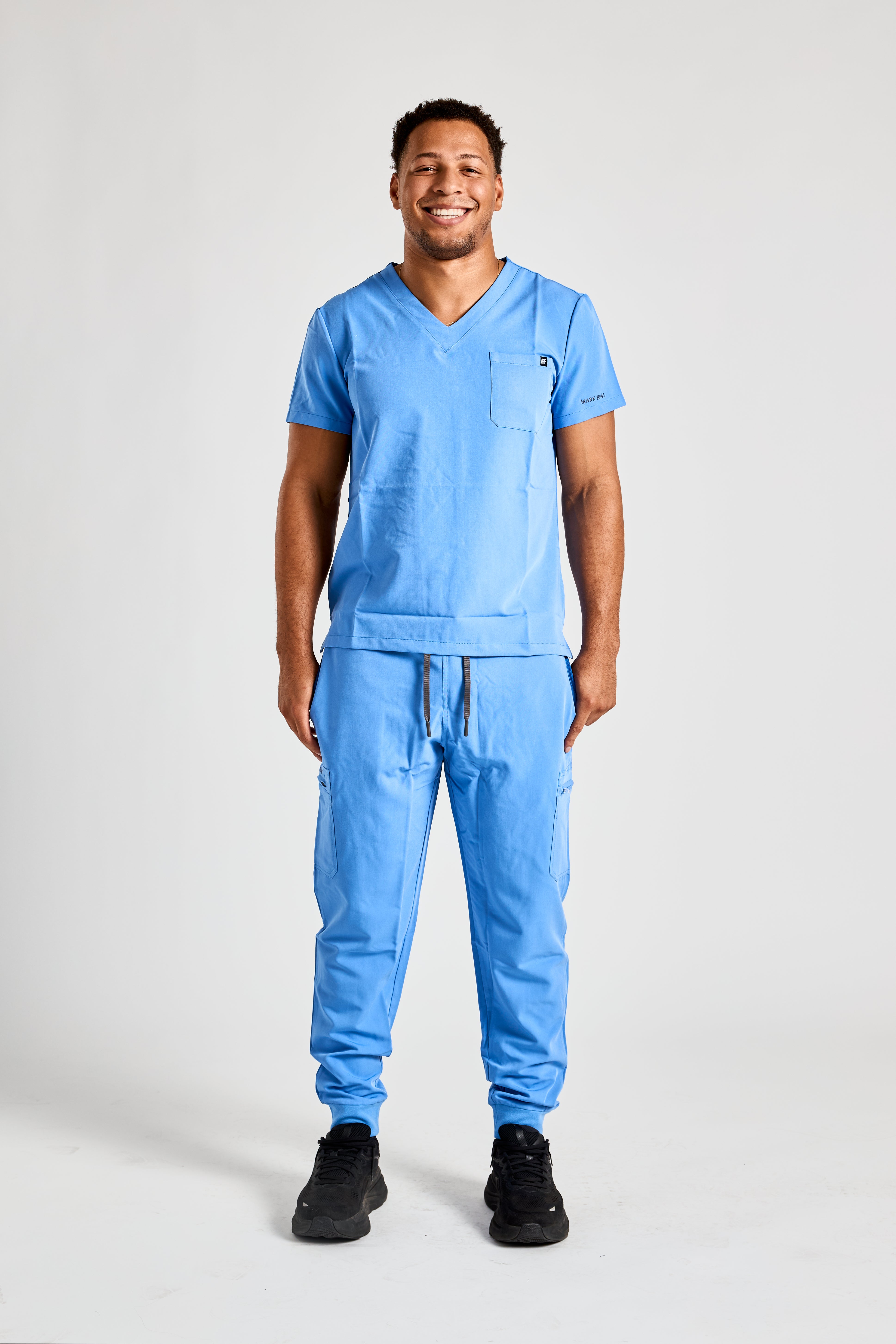 COVERED IN CEIL BLUE SCRUB SET