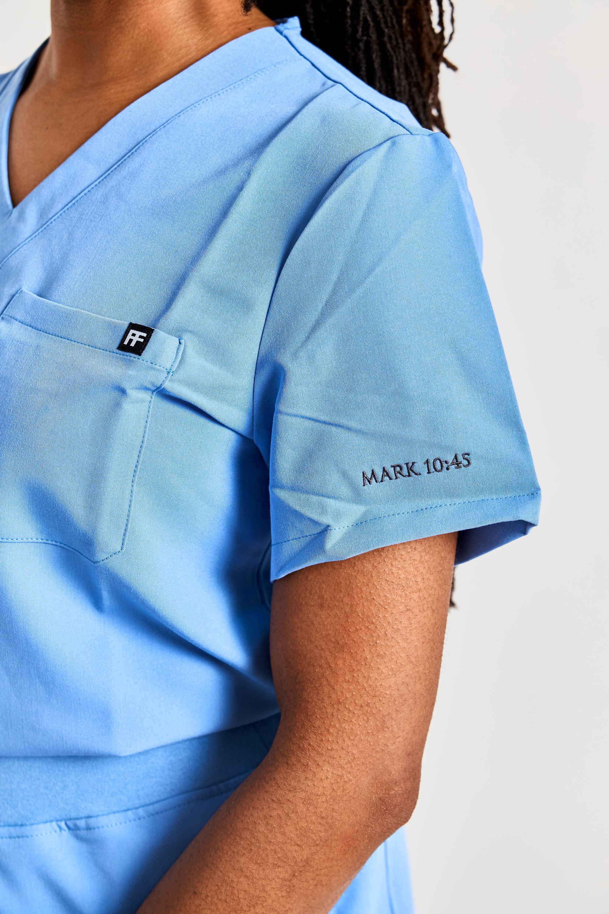 COVERED IN CEIL BLUE SCRUB SET